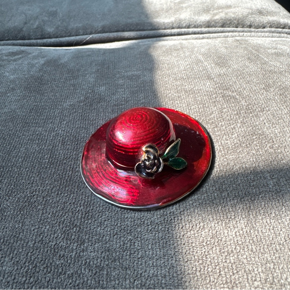 Red Hat Brooch with Floral Accent